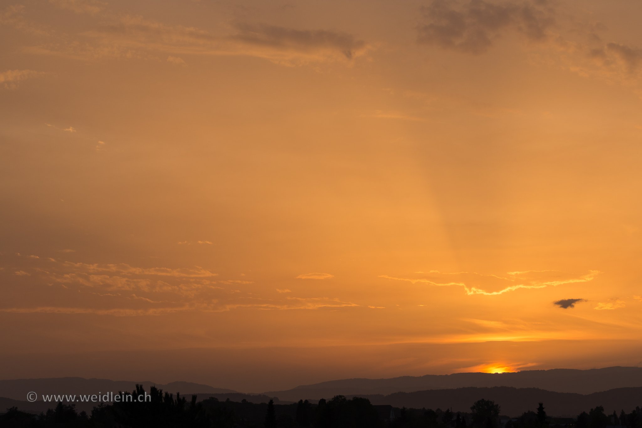 Sun behnd Jura